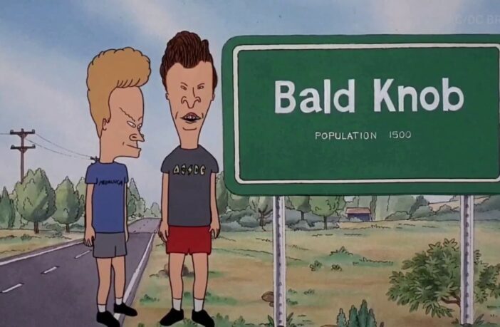 Beavis and Butthead beside Bald Knob road sign
